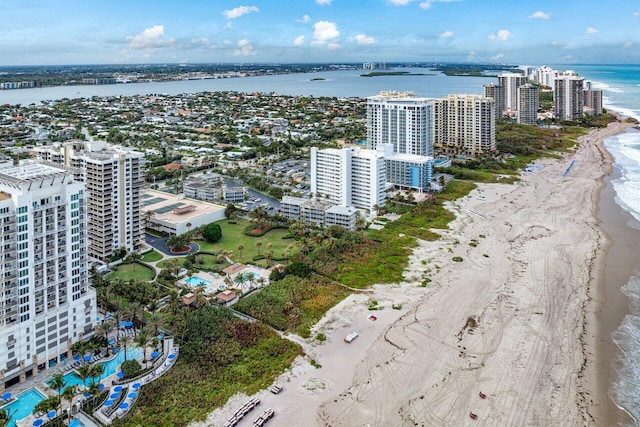 aerial view featuring a water view and a view of the beach