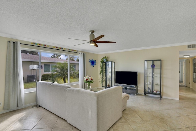 living area with ornamental molding, visible vents, ceiling fan, and light tile patterned floors