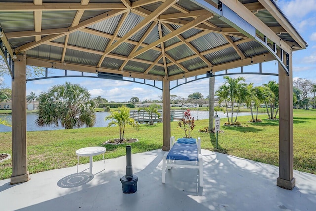 view of patio / terrace with a water view and a gazebo