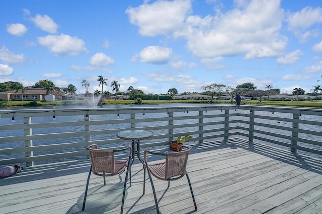 deck featuring a water view