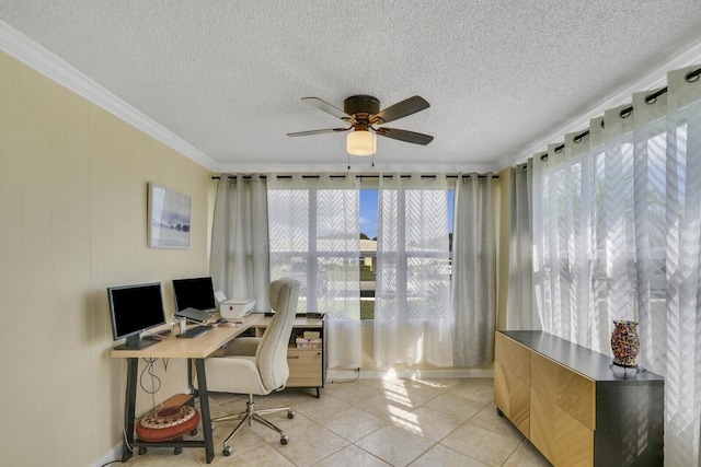 office area featuring light tile patterned floors, ceiling fan, ornamental molding, and a textured ceiling