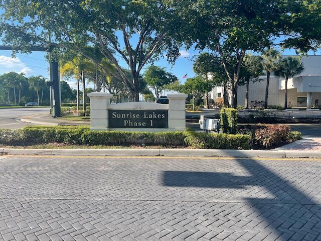 view of community sign