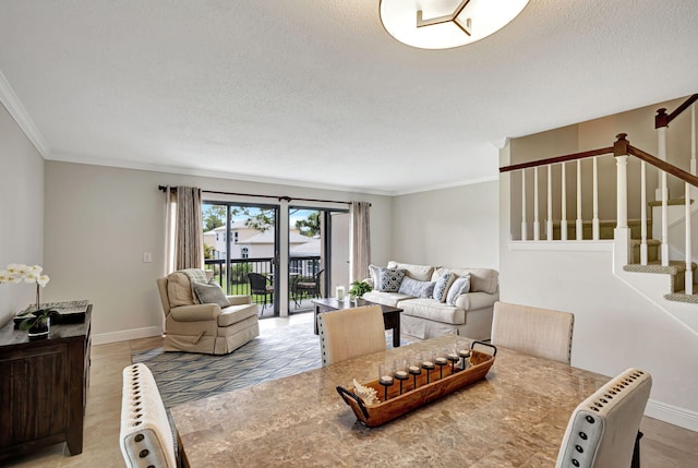 living room featuring a textured ceiling and crown molding