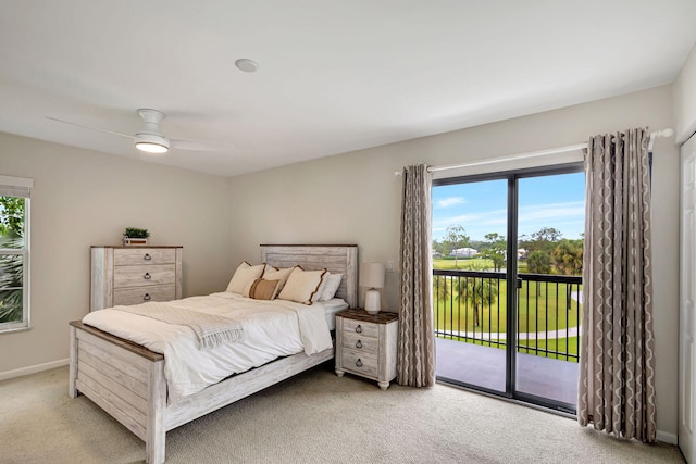 bedroom featuring access to exterior, ceiling fan, and light colored carpet