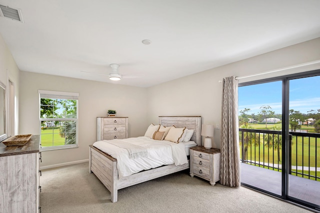 carpeted bedroom with access to outside and ceiling fan