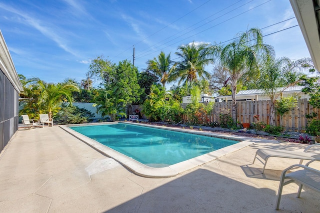 view of pool featuring a patio area