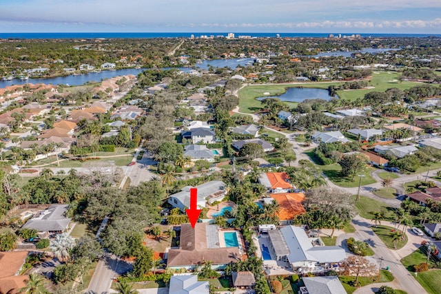 bird's eye view with a water view