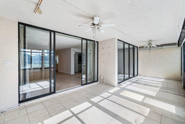 view of patio with ceiling fan