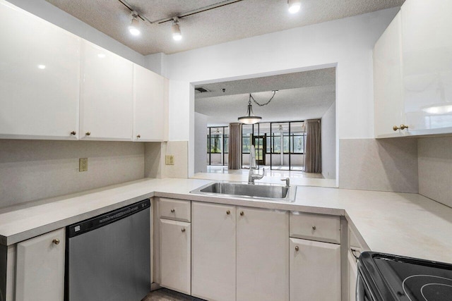 kitchen featuring electric range, white cabinetry, stainless steel dishwasher, and track lighting