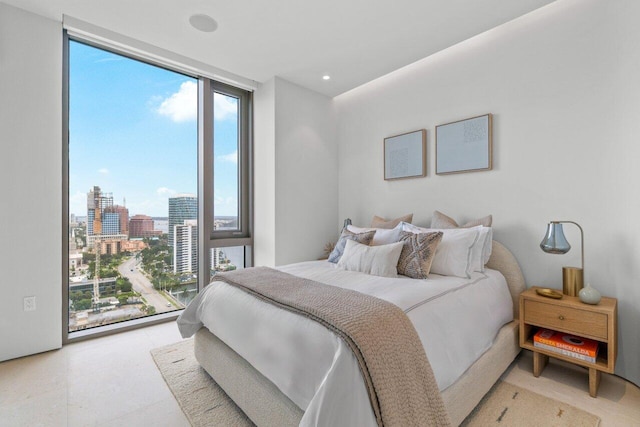 bedroom featuring expansive windows