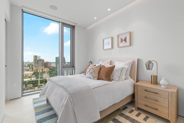 bedroom with a wall of windows