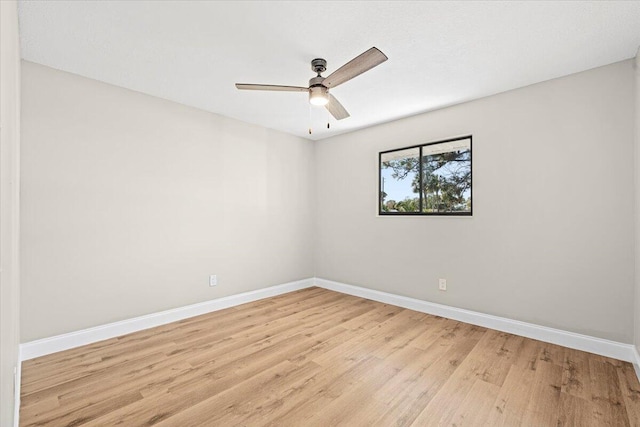 spare room featuring light wood-type flooring