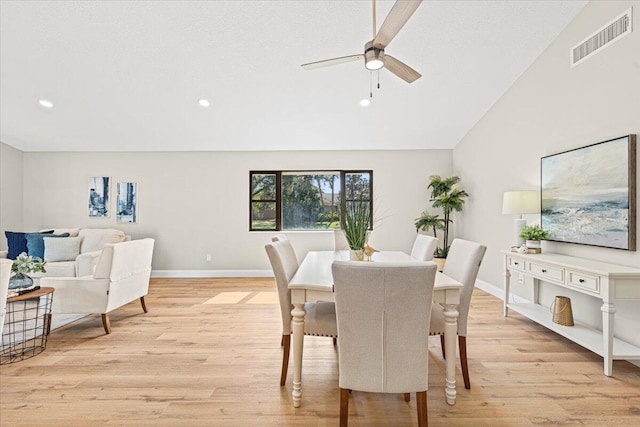 dining area featuring ceiling fan and light hardwood / wood-style flooring