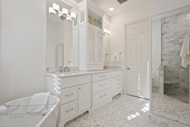 bathroom with separate shower and tub, vanity, and tile patterned flooring