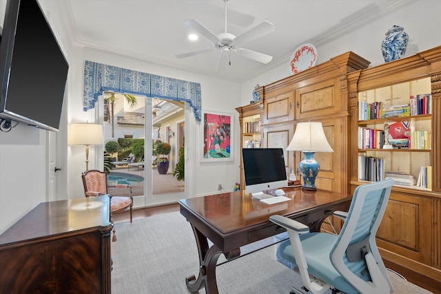 office area featuring light wood-type flooring, ceiling fan, crown molding, and french doors