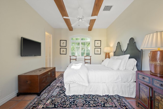 bedroom with ceiling fan and light tile patterned floors