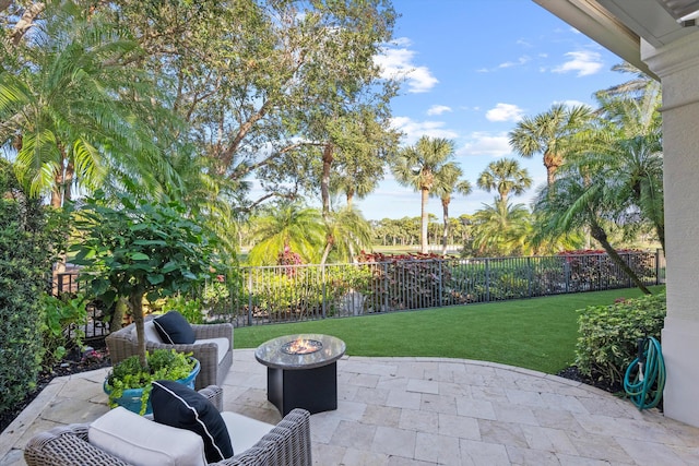 view of patio / terrace with a fire pit