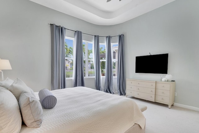 bedroom with ceiling fan and carpet