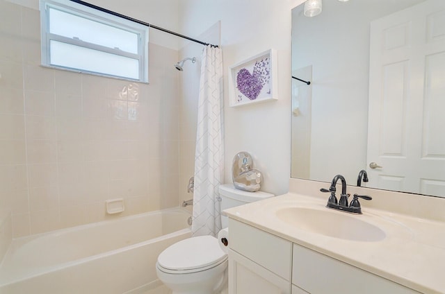 full bathroom with vanity, shower / bathtub combination with curtain, and toilet