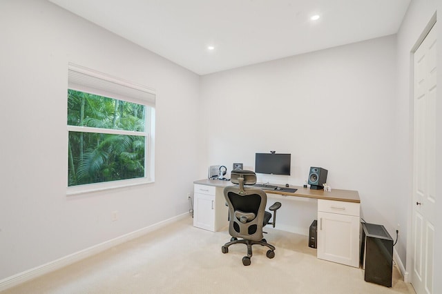 office space with light colored carpet