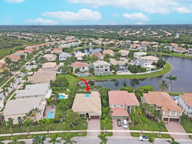 drone / aerial view with a water view