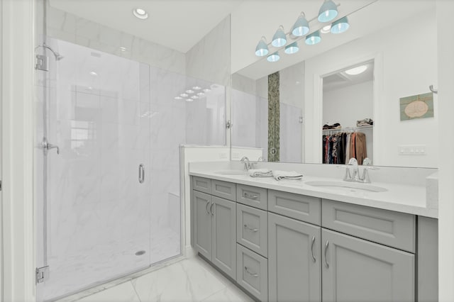 bathroom with vanity and walk in shower