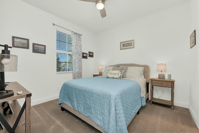 bedroom with dark carpet and ceiling fan