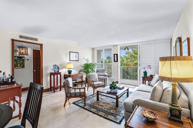 living room featuring a textured ceiling