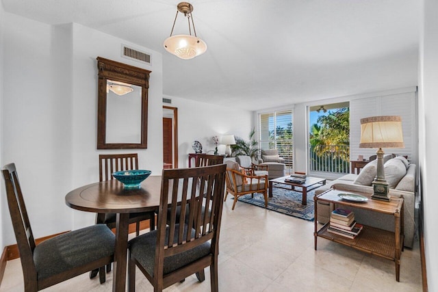 dining space with visible vents