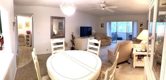 living room with ceiling fan and light carpet