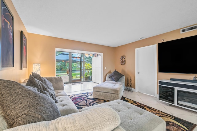 living room with light tile patterned flooring