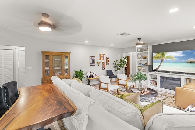 living room featuring ceiling fan