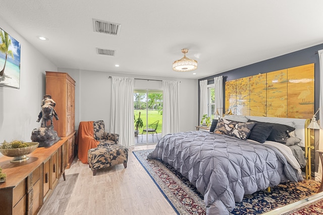 bedroom featuring light hardwood / wood-style flooring