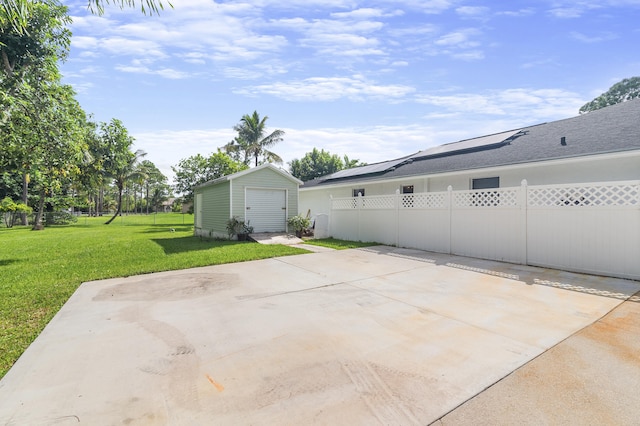 view of patio with a storage unit