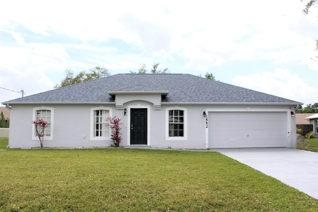 single story home with driveway, a garage, a front lawn, and stucco siding