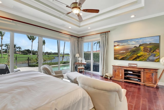 bedroom featuring a raised ceiling, ceiling fan, access to outside, and ornamental molding