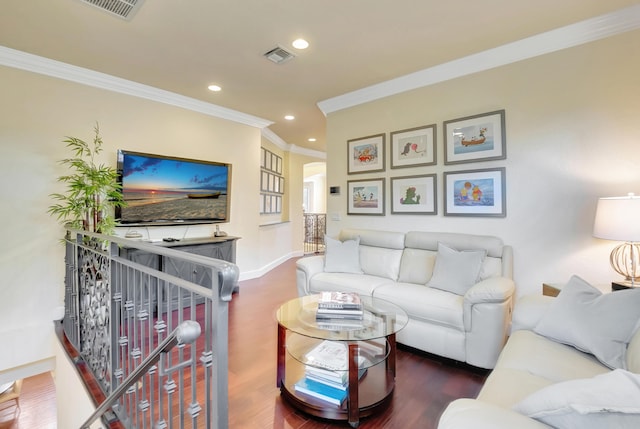 living room with crown molding and dark wood-type flooring