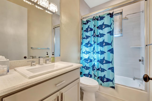 full bathroom with shower / bath combo, vanity, and toilet