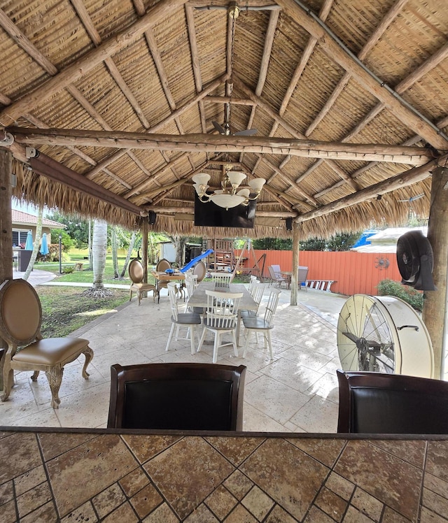 view of patio with a gazebo and ceiling fan