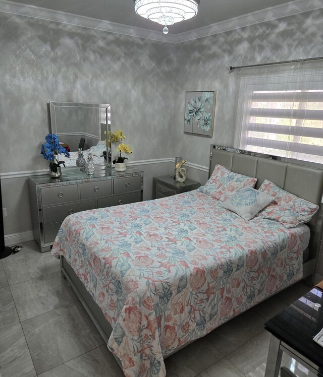 bedroom featuring crown molding and light tile patterned floors