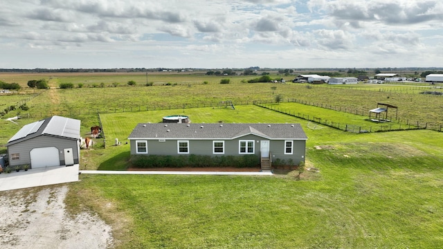 birds eye view of property with a rural view