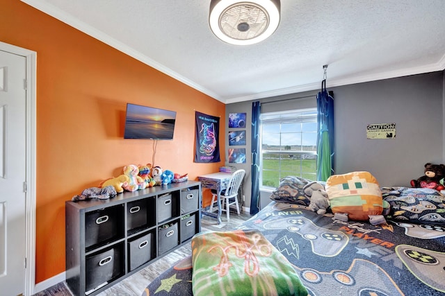 bedroom with lofted ceiling, a textured ceiling, and crown molding