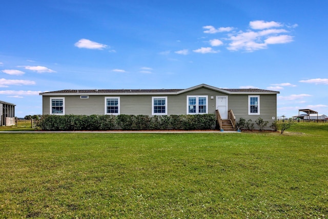 view of front facade with a front yard