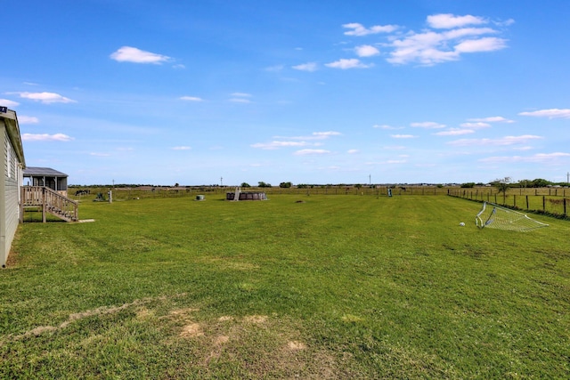 view of yard featuring a rural view