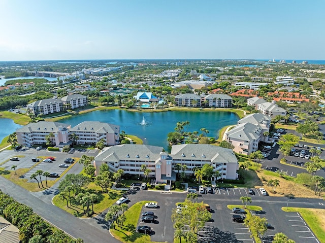 drone / aerial view with a water view