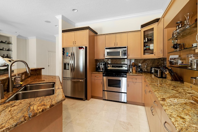 kitchen featuring crown molding, stainless steel appliances, sink, and light brown cabinets