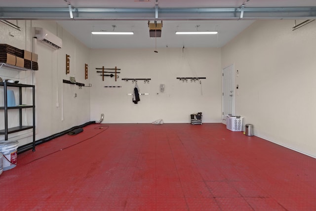 garage with a garage door opener and a wall mounted air conditioner