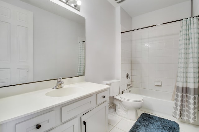 full bathroom with tile patterned floors, shower / tub combo with curtain, vanity, and toilet