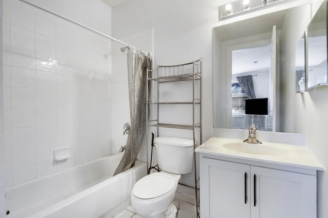 full bathroom featuring shower / bath combination with curtain, vanity, and toilet