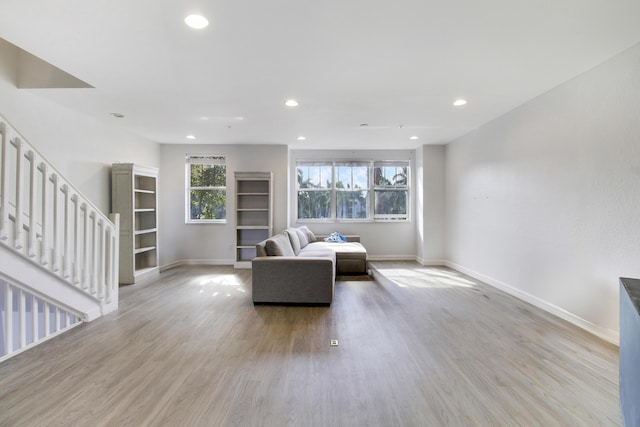 unfurnished living room featuring light hardwood / wood-style flooring